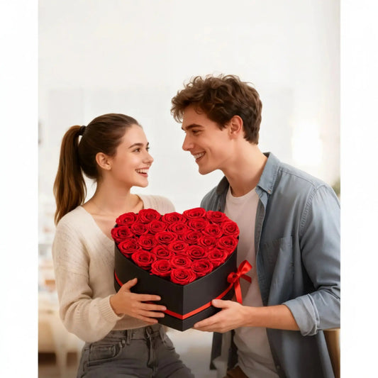 Couple holding a heart-shaped box of red roses with text 'Cherish Love That Lasts Forever' on a white background.