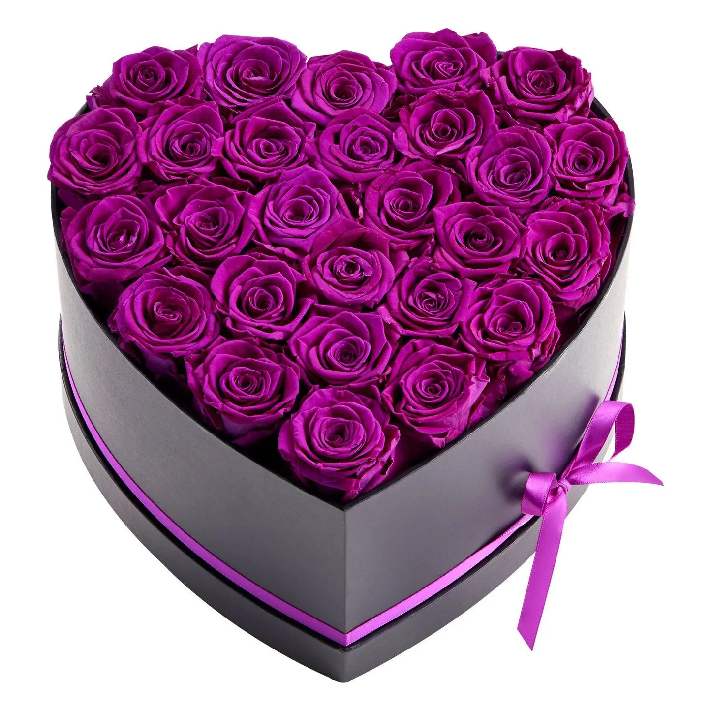 A heart-shaped black gift box filled with preserved deep purple roses, tied with a matching purple ribbon, on a plain white background.