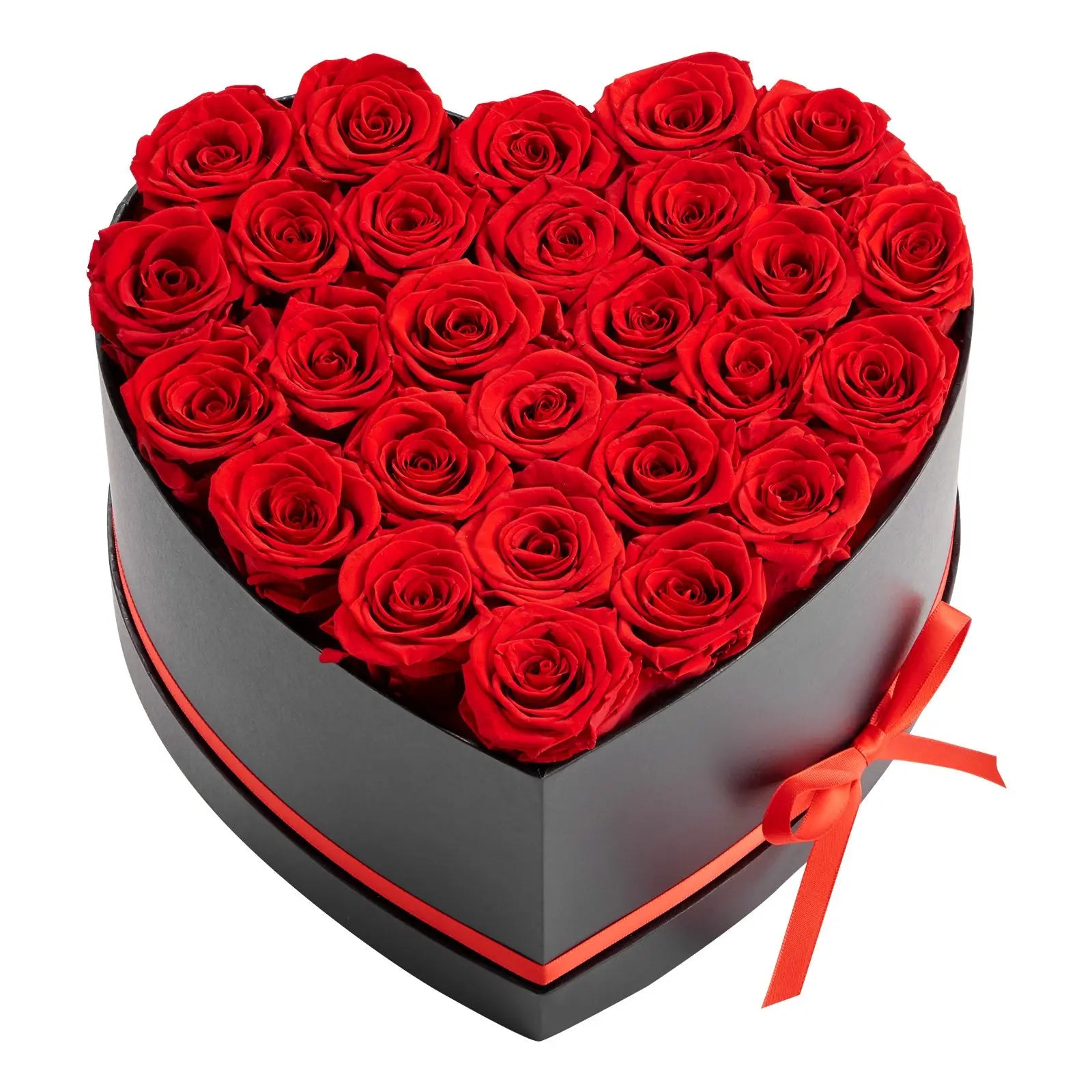 Heart-shaped box filled with red roses on a white background